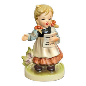 Little girl singing ceramic vintage figure pre-owned well cared for